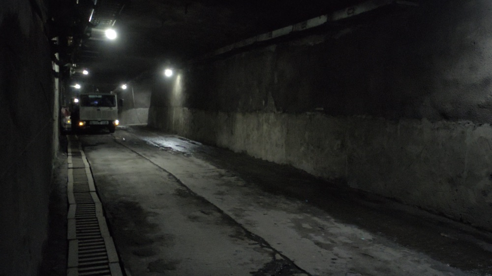 Work vehicle inside an underground mining tunnel