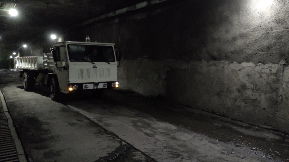 Mining vehicles in an industrial operating area